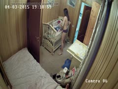 Voyeur sets up a camera to record a lustful wife getting nude and masturbating.